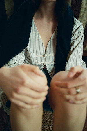 woman stretching in shirt